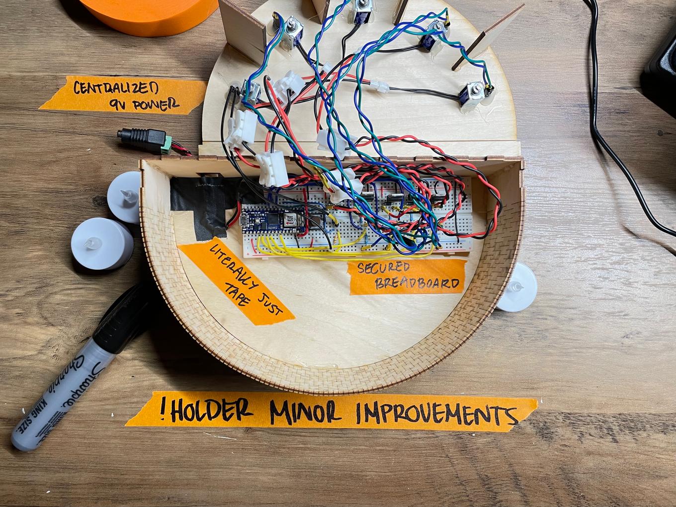 minor improvements, including anchoring breadboard, combining power, and providing stability for plug